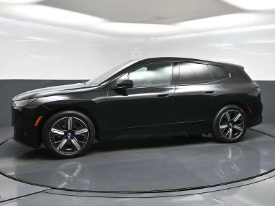 2023 BMW iX — rear three-quarter view