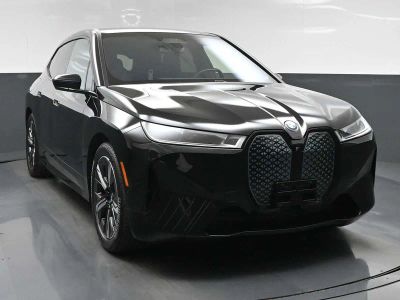 2023 BMW iX xDrive50 in Black — front three-quarter view