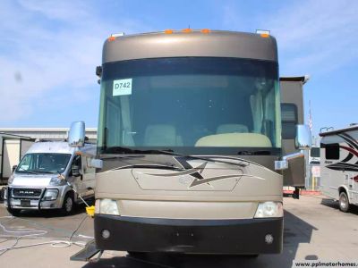 2006 Country Coach DAVINCI 400 — rear three-quarter view