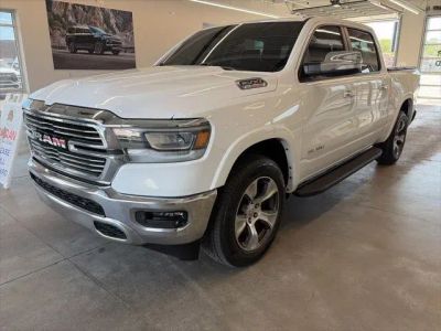 2022 RAM 1500 Laramie Crew Cab 4x4 5'7' Box in Bright White Clearcoat — front three-quarter view