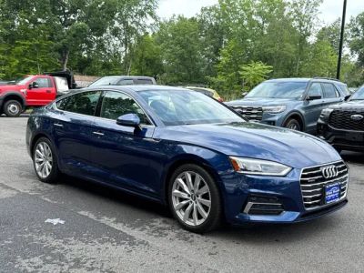 2018 Audi A5 Sportback Premium Plus in Blue Metallic — front three-quarter view