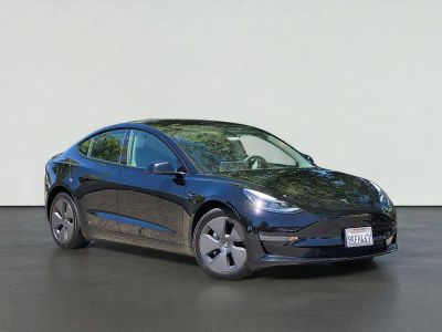 2023 Tesla MODEL 3 BASE in Black — front three-quarter view