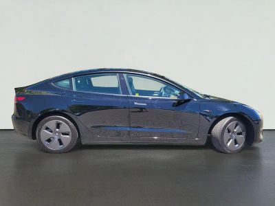 2023 Tesla MODEL 3 — rear three-quarter view