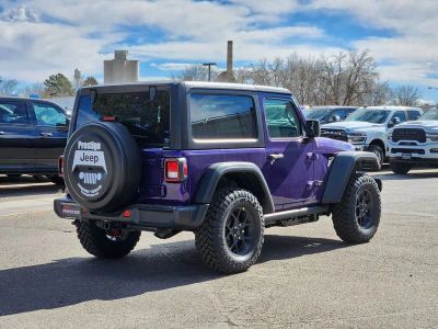 2026 Jeep Wrangler — rear three-quarter view