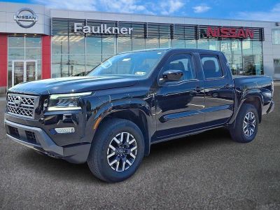 2024 Nissan Frontier — rear three-quarter view