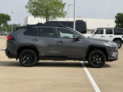 2024 Toyota RAV4 Hybrid — rear three-quarter view