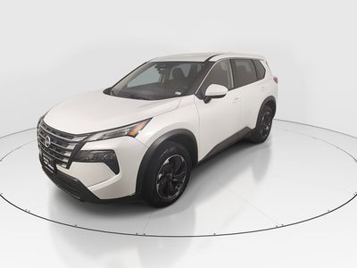 2025 Nissan Rogue — rear three-quarter view