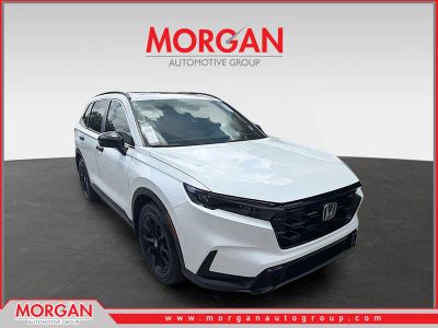 2024 Honda CR-V Hybrid Sport-L in Platinum White Pearl — front three-quarter view