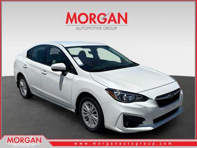 2017 Subaru Impreza 2.0i Premium in White — front three-quarter view