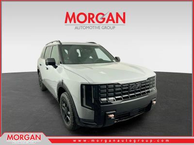 2027 Kia Telluride X-Pro SX-Prestige in Wolf Gray — front three-quarter view