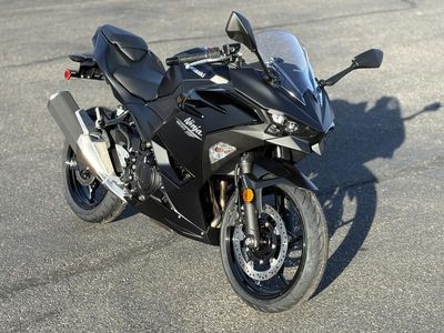 2026 Kawasaki Ninja 500 ABS Metallic Flat Spark Black in METALLIC FLAT SPARK BLACK/METALLIC SPARK BLACK — front three-quarter view