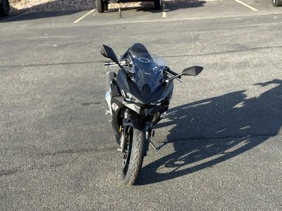 2026 Kawasaki Ninja 500 ABS Metallic Flat Spark Black — rear three-quarter view