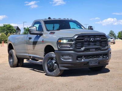 2026 RAM 3500 RAM 3500 TRADESMAN REGULAR CAB 4X4 8' BOX in Ceramic Gray Clear-Coat Exterior Paint — front three-quarter view