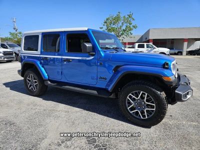 2026 Jeep Wrangler — rear three-quarter view