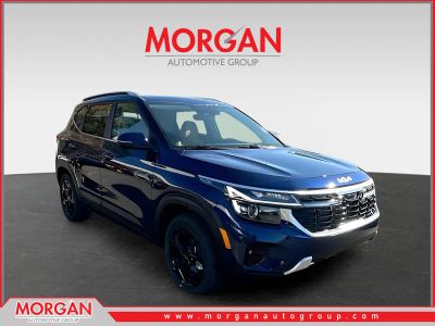 2026 Kia Seltos EX in Blue — front three-quarter view