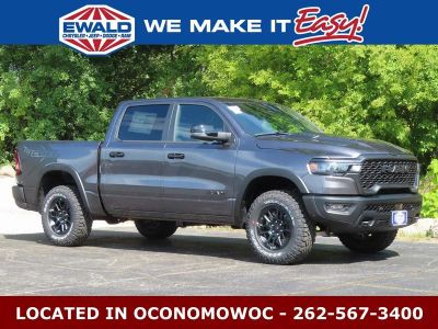 2026 RAM 1500 RAM 1500 REBEL CREW CAB 4X4 5'7' BOX in Granite Crystal Metallic Clear-Coat Exterior Paint — front three-quarter view
