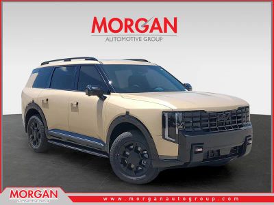 2027 Kia Telluride X-Pro SX-Prestige in Terrain Brown Matte — front three-quarter view
