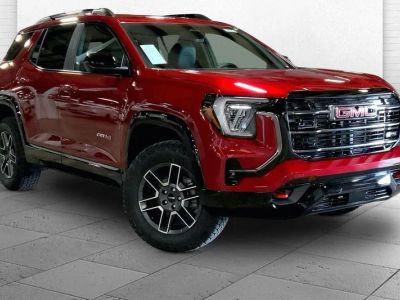 2026 GMC Terrain AT4 in Volcanic Red Tintcoat — front three-quarter view