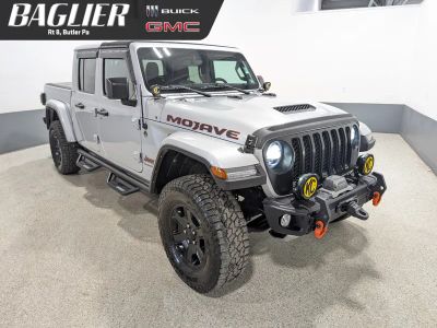 2022 Jeep Gladiator Mojave 4x4 in Silver — front three-quarter view