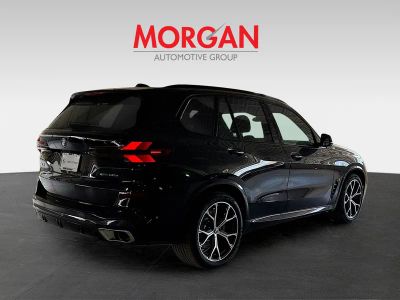 2026 BMW X5 — rear three-quarter view