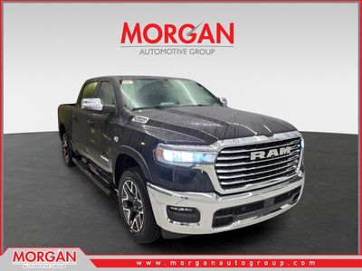 2026 Ram 1500 Laramie in Diamond Black Crystal Pearlcoat — front three-quarter view