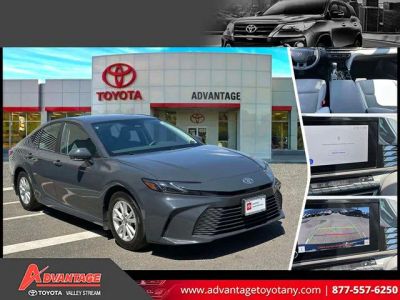 2025 Toyota Camry LE in Dark Grey — front three-quarter view