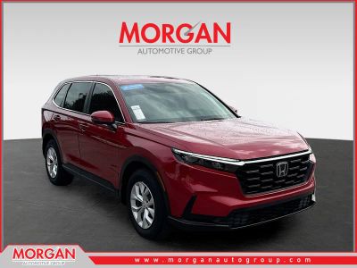 2024 Honda CR-V LX in Radiant Red Metallic — front three-quarter view