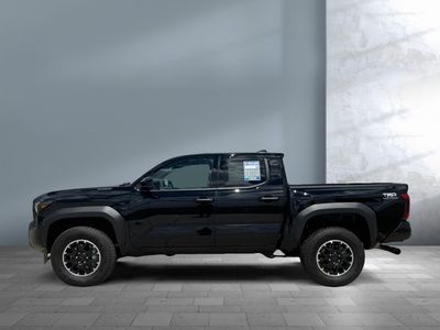 2025 Toyota Tacoma — rear three-quarter view