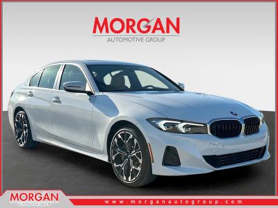 2026 BMW 3 Series 330i in Alpine White — front three-quarter view
