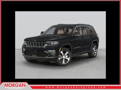 2022 Jeep Grand Cherokee Summit 4xe in White — front three-quarter view