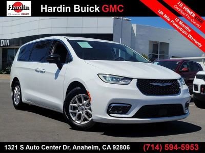 2024 Chrysler Pacifica Touring L in White — front three-quarter view