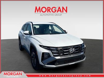 2026 Hyundai TUCSON SEL in Serenity White Pearl — front three-quarter view