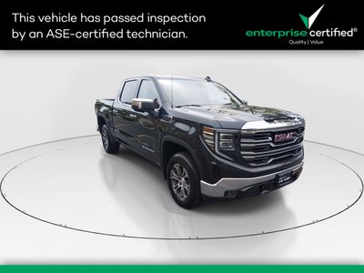 2025 GMC Sierra 1500 4WD Crew Cab 147" SLT — front three-quarter view