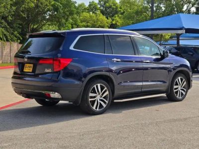 2016 Honda Pilot — rear three-quarter view