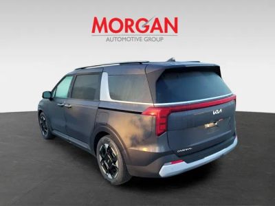 2026 Kia Carnival — rear three-quarter view