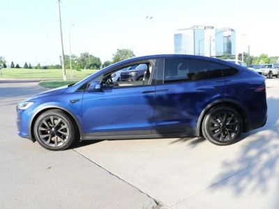 2023 Tesla Model X — rear three-quarter view