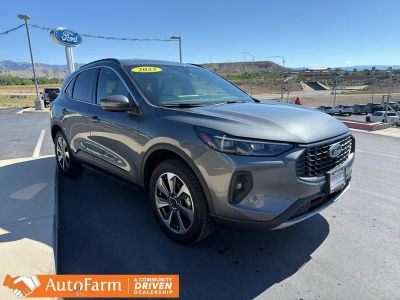 2025 Ford Escape Platinum in Carbonized Gray Metallic — front three-quarter view