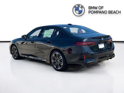 2026 BMW 5 Series — rear three-quarter view