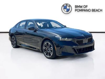 2026 BMW 5 Series 530i in Black — front three-quarter view