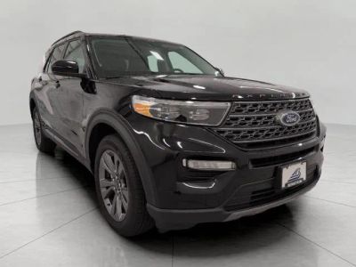 2024 Ford Explorer XLT 4WD in Agate Black Metallic — front three-quarter view