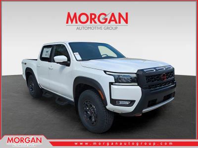 2026 Nissan Frontier PRO-4X in White — front three-quarter view