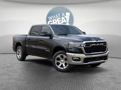 2026 RAM 1500 Big Horn/Lone Star in Diamond Black Crystal Pearl-Coat Exterior Paint — front three-quarter view