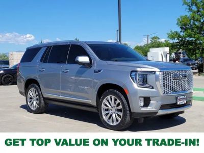 2024 GMC Yukon Denali in Sterling Metallic — front three-quarter view
