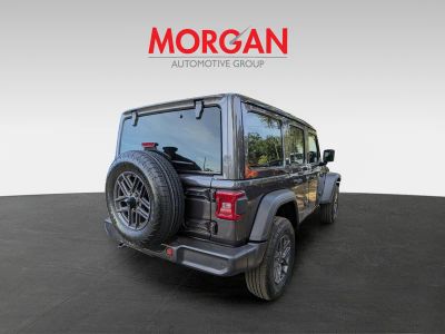 2026 Jeep Wrangler — rear three-quarter view