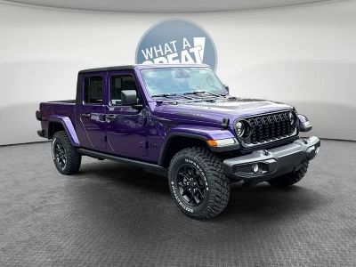 2026 Jeep Gladiator GLADIATOR WILLYS 4X4 in Reign Exterior Paint — front three-quarter view