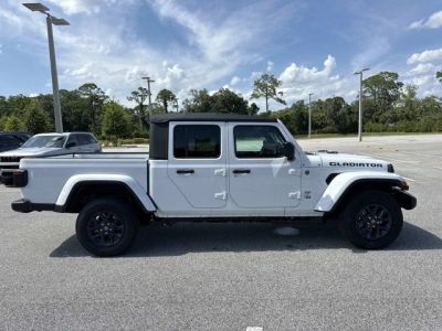 2026 Jeep Gladiator 85th Anniversary Edition in Bright White Clearcoat — front three-quarter view