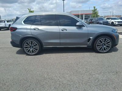 2025 BMW X5 — rear three-quarter view