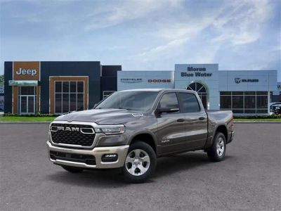2026 RAM Ram 1500 RAM 1500 BIG HORN CREW CAB 4X4 5'7' BOX in Granite Crystal Metallic Clear-Coat Exterior Paint — front three-quarter view