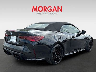 2026 BMW M4 — rear three-quarter view