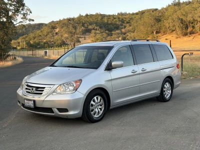 2010 Honda Odyssey in Silver — front three-quarter view
